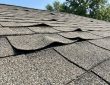 Curling shingles signal roof aging, moisture trapping, or bad ventilation. Learn what curling means for your home and how to prevent costly leak repairs.